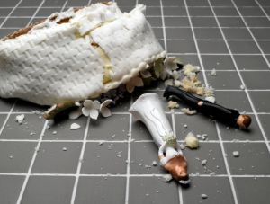 Smashed wedding cake on the floor