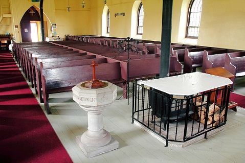 An empty church before baptism