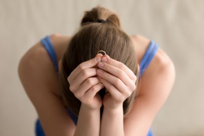 Anxious Woman Holding Ring