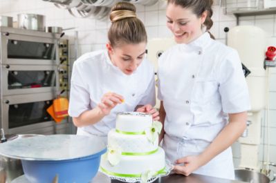 Bakers Making a Wedding Cake