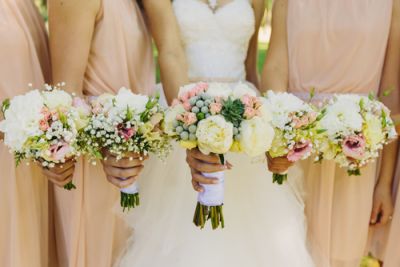 Bride and Bridesmaids With Flowers