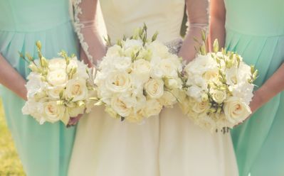 Bride and Bridesmaids Holding Bouquets