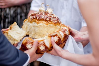 Bride and Groom Breaking Bread