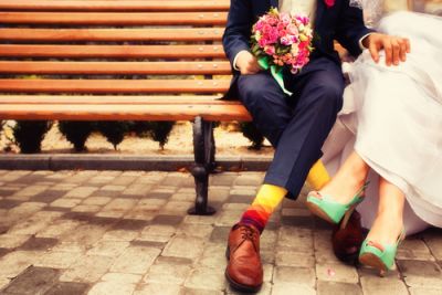 Bride and Groom Wearing Retro Colors