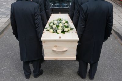 Carrying a Coffin at a Funeral