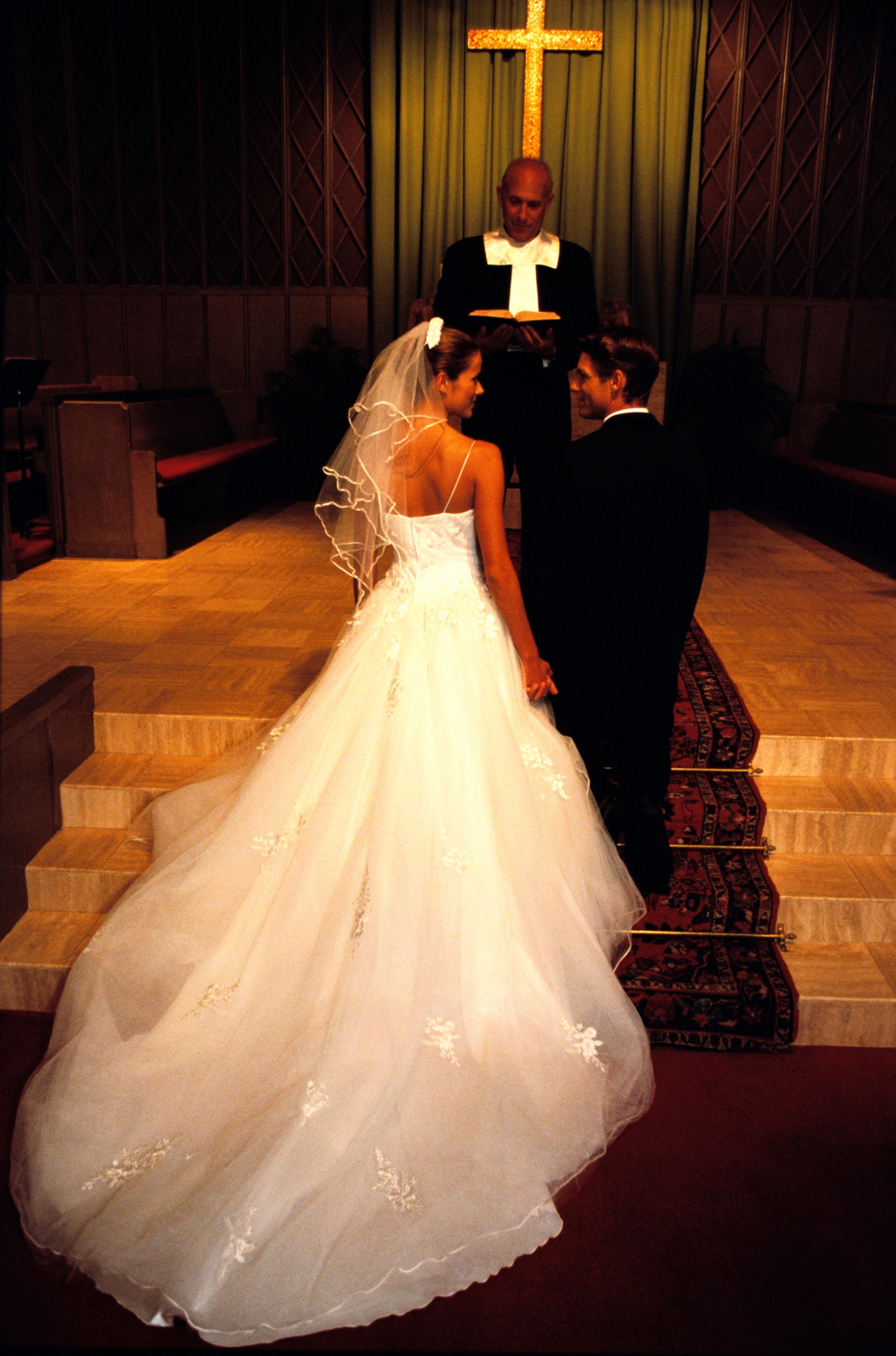 Bride and groom honor a loved one at their wedding. 