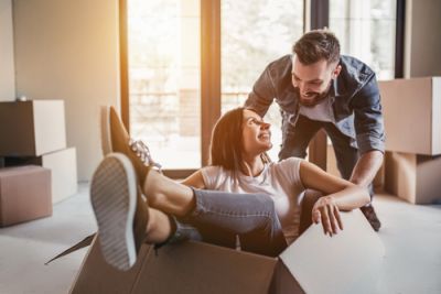 Couple Having Fun While Moving