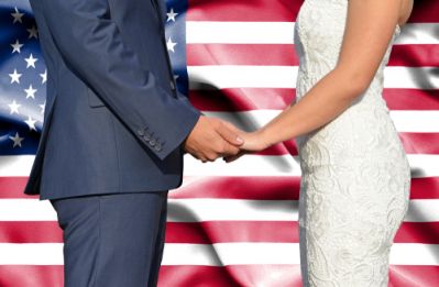 Couple in Front of the American Flag