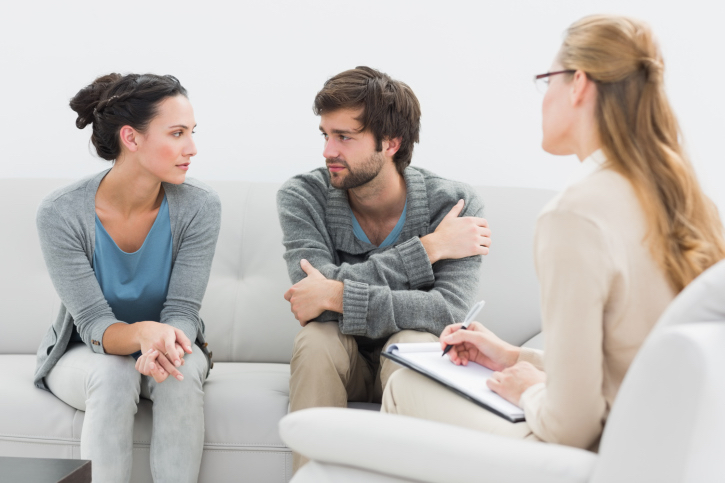 Couple sitting down for a marriage counseling session