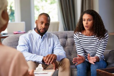 Young Couple Speaking With a Counselor