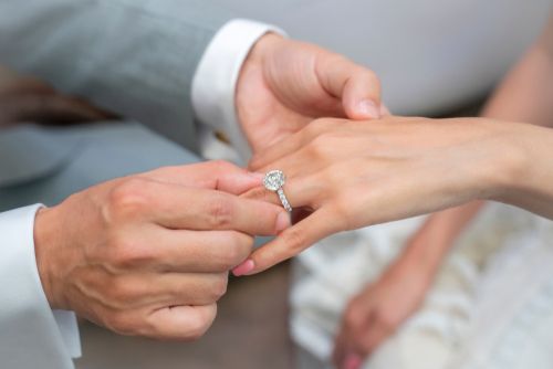 Engagement ring on finger