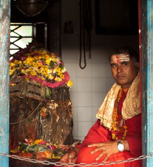Pujaris are temple priests; they perform worship services, maintain temples, and conduct ritual ceremonies.