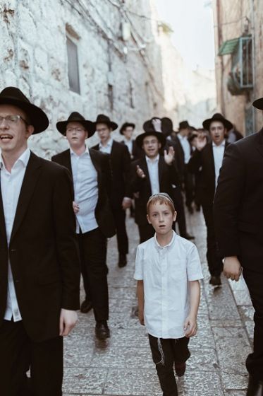 Jewish men and boys in a procession