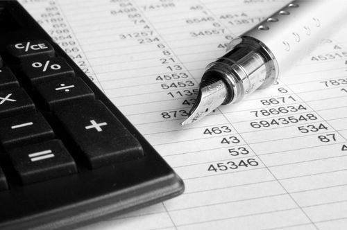 Pen, Calculator, and Budget