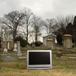 Television in graveyard.