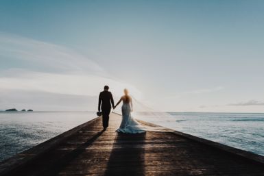couple silhouette in wedding attire