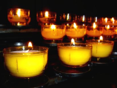 votive candles alight