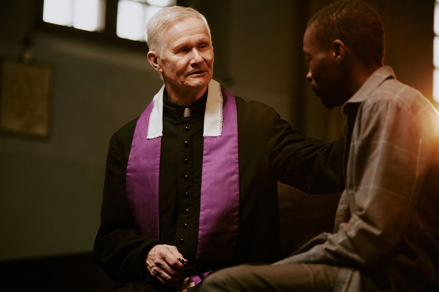 minister in conversation with parishioner