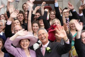 Wedding crowd waving and smiling, close-up