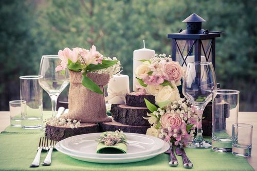 Wedding Place Setting With Candles and Flowers