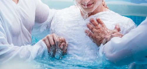 Woman Being Baptized