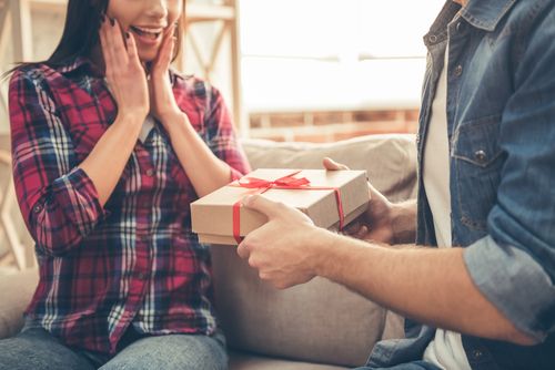 Woman Excited About Receiving a Gift