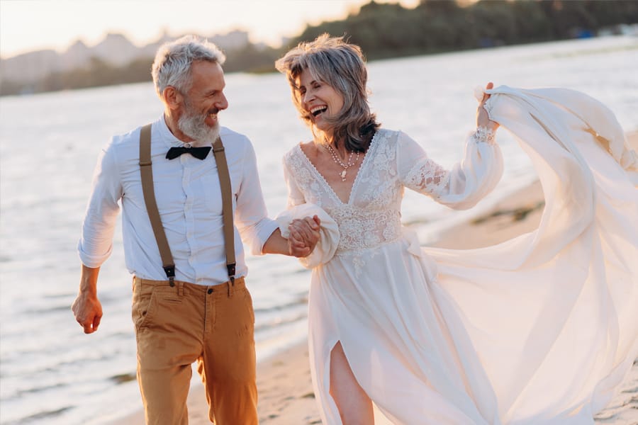Elderly couple celebrating after renewing vows
